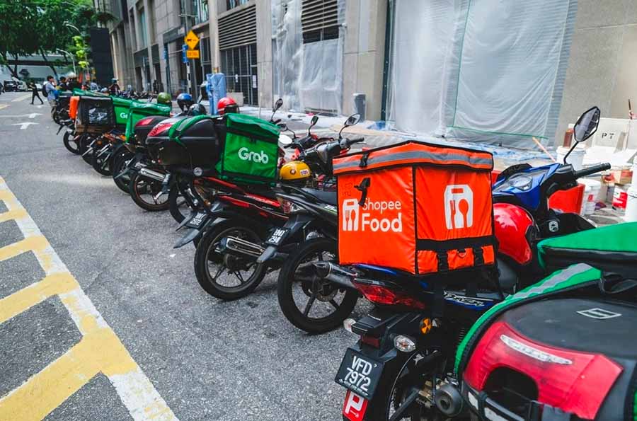 Fast food delivery rider navigating through Vietnam